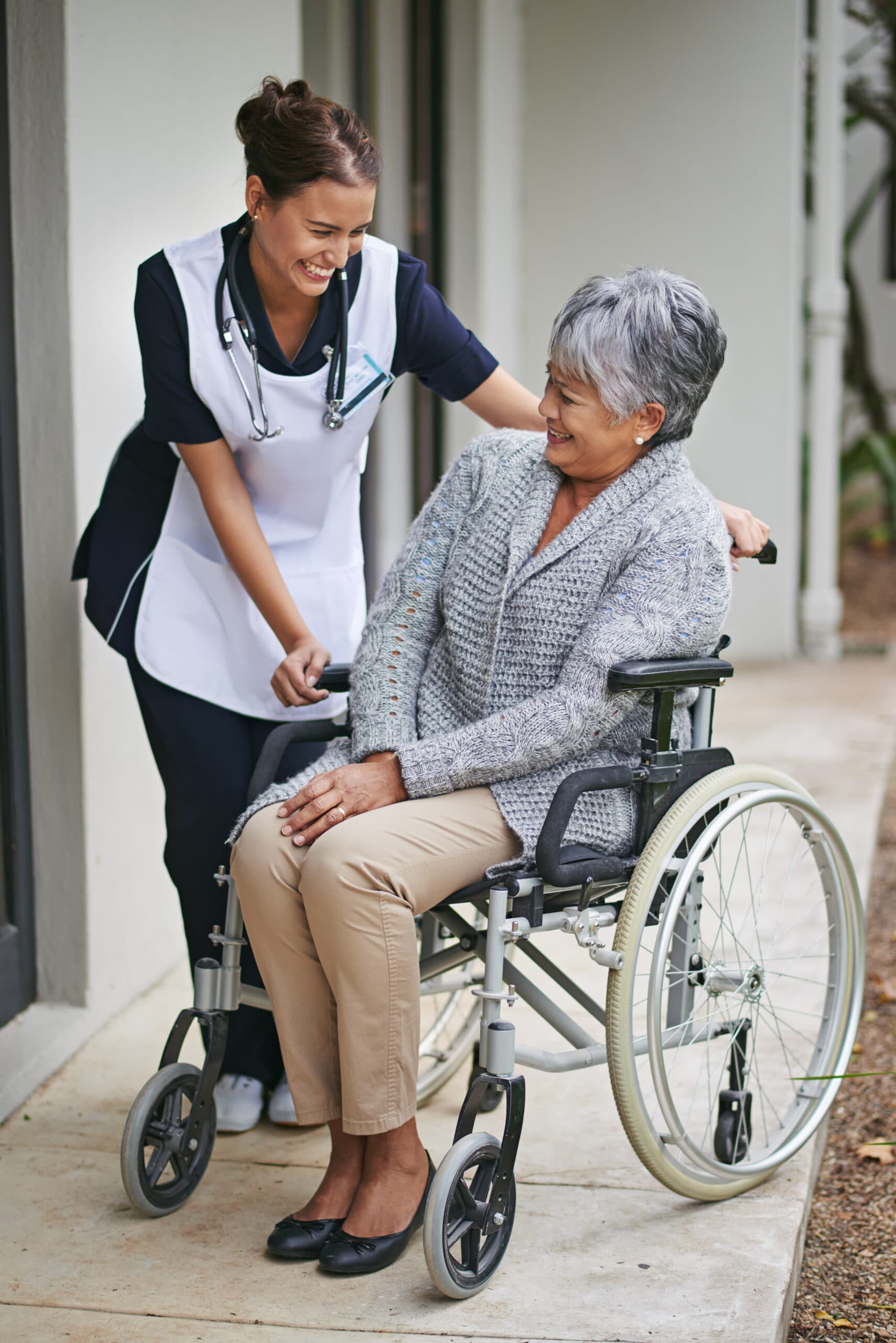 An aged care worker supporting a resident at home
