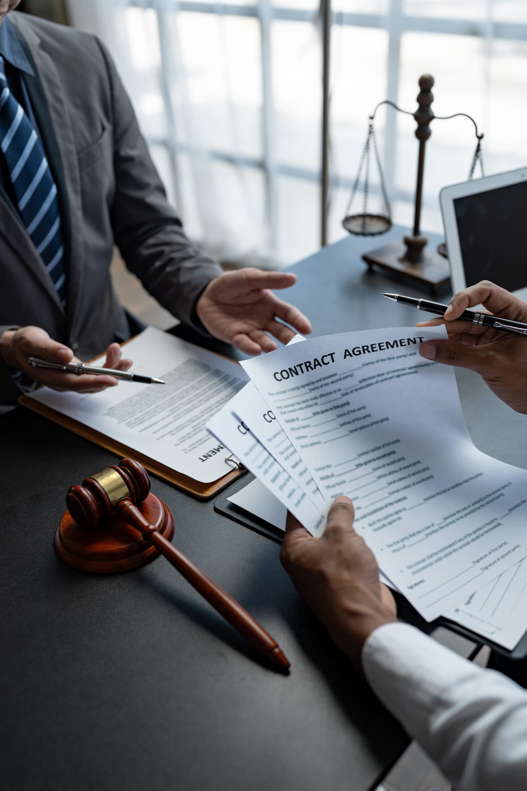 An NDIS compliance consultant reviewing provider registration documentation